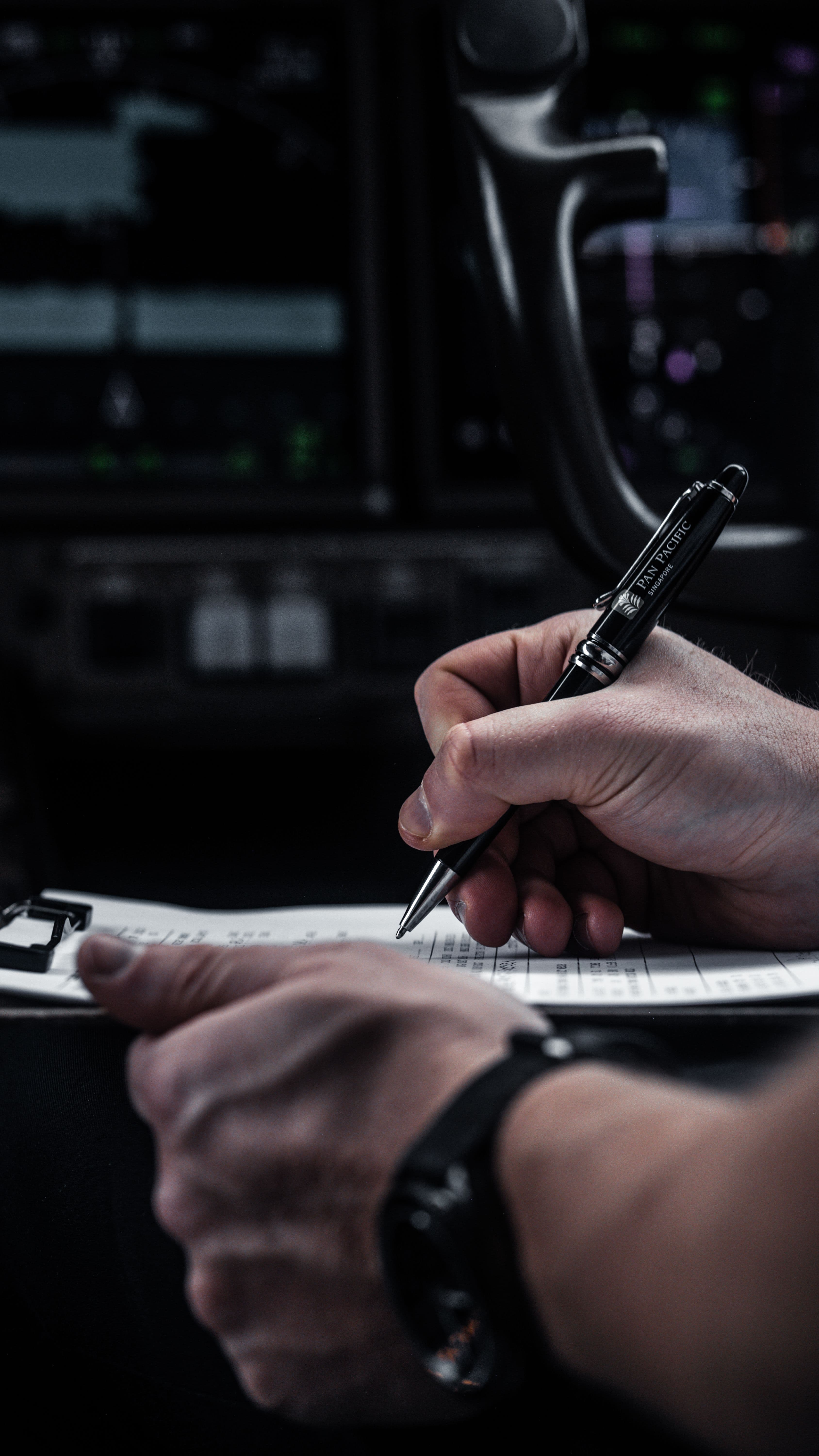 Pilot completing a preflight inspection